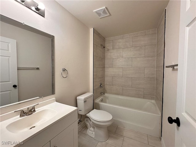 bathroom with visible vents, toilet,  shower combination, tile patterned flooring, and vanity