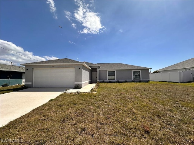 single story home featuring a front lawn, fence, stucco siding, driveway, and an attached garage