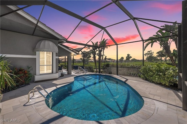 outdoor pool featuring a patio area