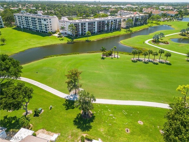 6102 Augusta Dr Unit 209, Fort Myers, FL 33907 - bird's eye view featuring golf course view and a water view