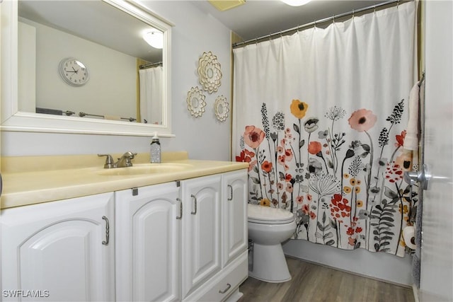 6102 Augusta Dr Unit 209, Fort Myers, FL 33907 - full bath featuring vanity, toilet, and wood finished floors