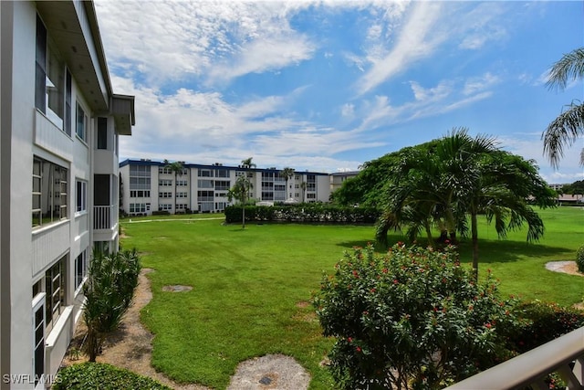 6102 Augusta Dr Unit 209, Fort Myers, FL 33907 - view of home's community featuring a lawn