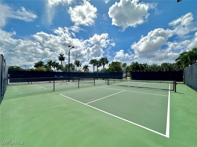 6102 Augusta Dr Unit 209, Fort Myers, FL 33907 - view of tennis court with fence