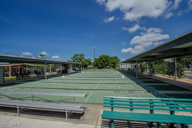 6102 Augusta Dr Unit 209, Fort Myers, FL 33907 - view of home's community featuring shuffleboard