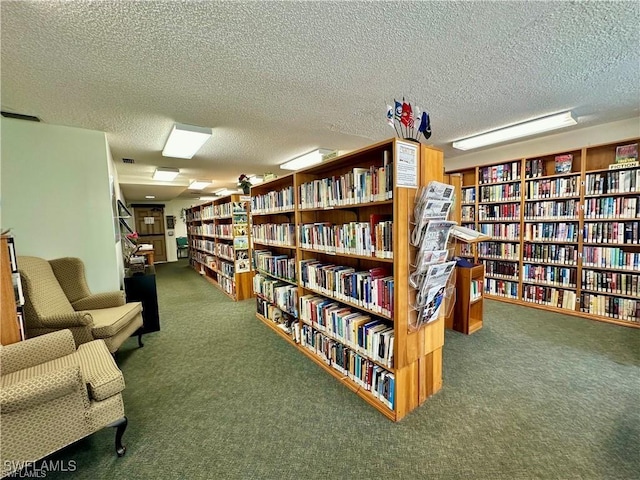 6102 Augusta Dr Unit 209, Fort Myers, FL 33907 - living area featuring carpet, wall of books, and a textured ceiling