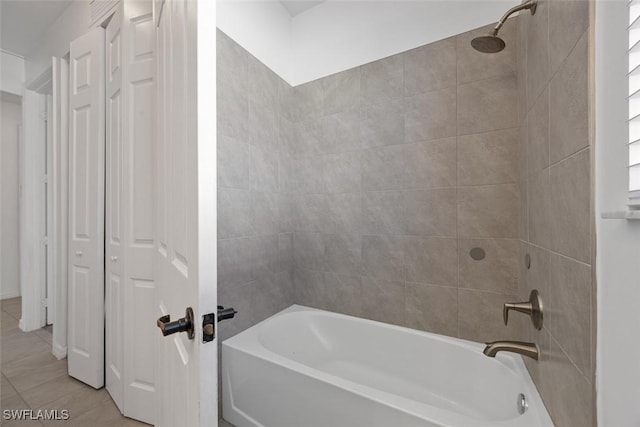 full bath with tile patterned flooring and bathing tub / shower combination