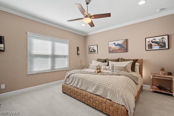 carpeted bedroom with recessed lighting, baseboards, a ceiling fan, and crown molding