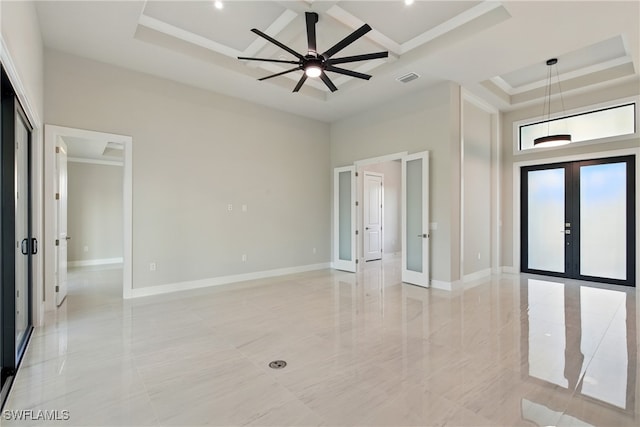 1912 SW 12th St, Cape Coral, FL 33991 - unfurnished bedroom featuring crown molding, baseboards, french doors, a towering ceiling, and a raised ceiling