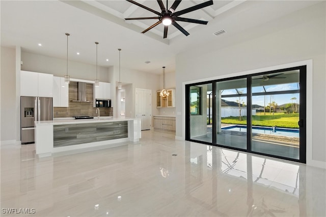 1912 SW 12th St, Cape Coral, FL 33991 - kitchen with visible vents, stainless steel fridge with ice dispenser, ceiling fan, white cabinetry, and modern cabinets