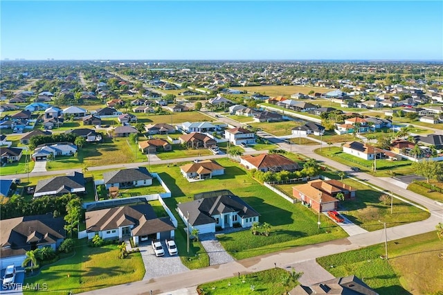 1912 SW 12th St, Cape Coral, FL 33991 - drone / aerial view with a residential view