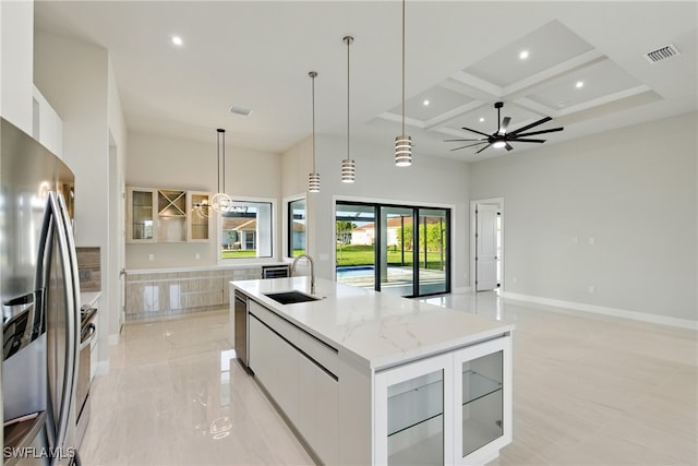1912 SW 12th St, Cape Coral, FL 33991 - kitchen with a large island with sink, a towering ceiling, stainless steel appliances, modern cabinets, and a sink