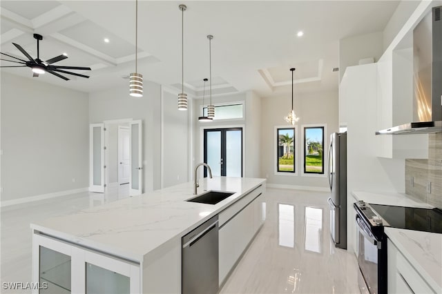 1912 SW 12th St, Cape Coral, FL 33991 - kitchen featuring coffered ceiling, stainless steel appliances, wall chimney exhaust hood, modern cabinets, and open floor plan