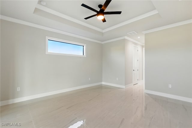 1912 SW 12th St, Cape Coral, FL 33991 - unfurnished room featuring visible vents, ceiling fan, baseboards, a tray ceiling, and ornamental molding