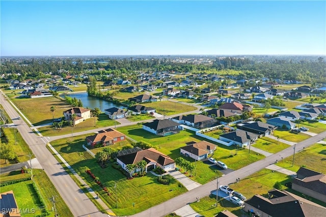 1912 SW 12th St, Cape Coral, FL 33991 - drone / aerial view featuring a residential view and a water view