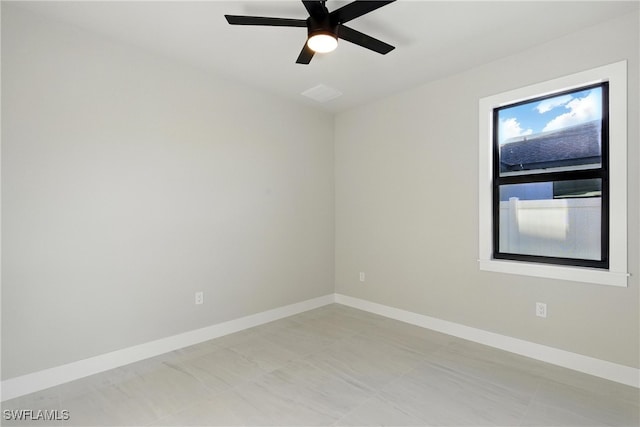 1912 SW 12th St, Cape Coral, FL 33991 - empty room with baseboards and a ceiling fan