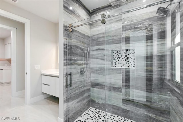 1912 SW 12th St, Cape Coral, FL 33991 - bathroom with a shower stall, vanity, and baseboards