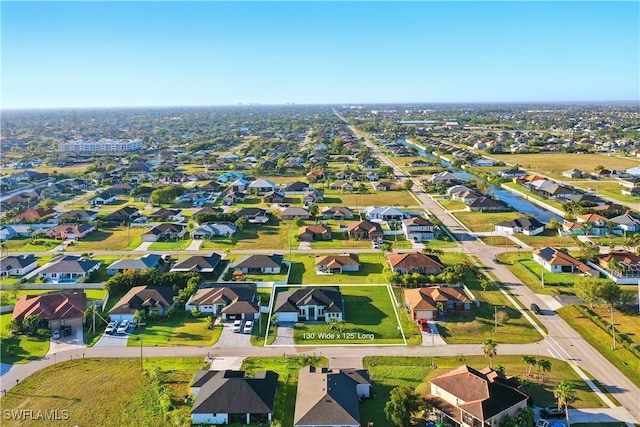 1912 SW 12th St, Cape Coral, FL 33991 - aerial view with a residential view
