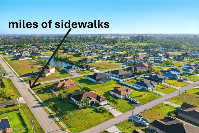 1912 SW 12th St, Cape Coral, FL 33991 - drone / aerial view featuring a residential view