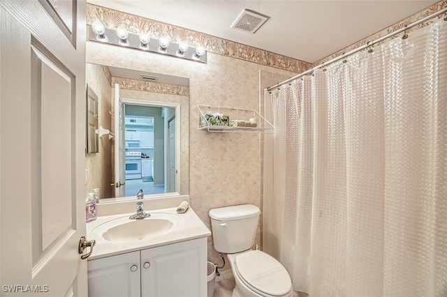 bathroom featuring visible vents, toilet, curtained shower, wallpapered walls, and vanity