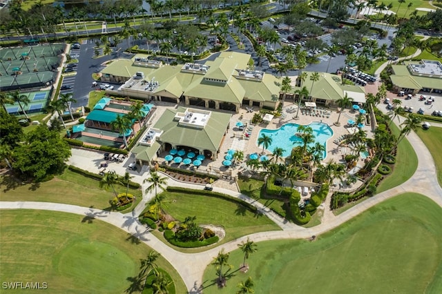 birds eye view of property with golf course view