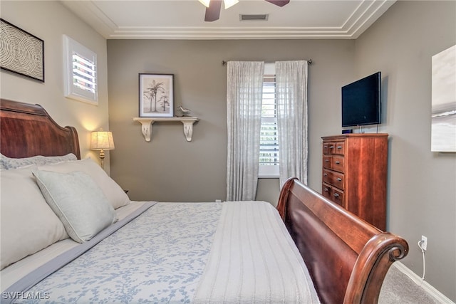 bedroom with visible vents, baseboards, and a ceiling fan