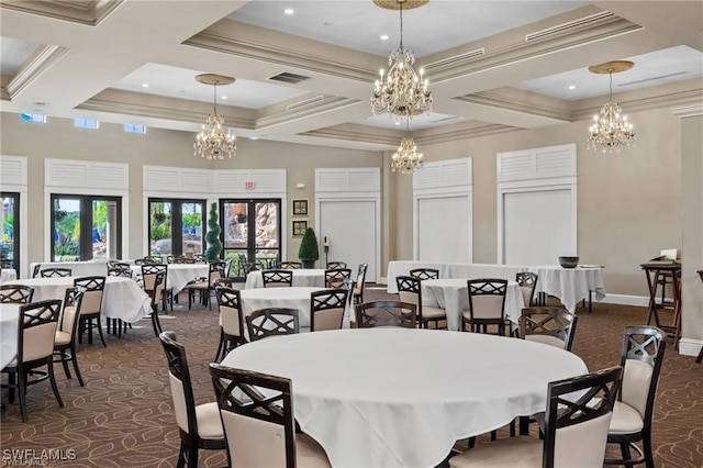 dining space featuring a notable chandelier, visible vents, and coffered ceiling