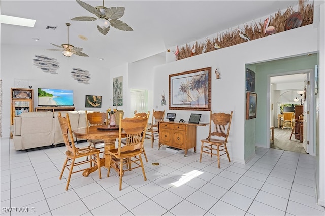 2810 Teal Ct, Saint James City, FL 33956 - dining space featuring a ceiling fan, light tile patterned flooring, high vaulted ceiling, and visible vents
