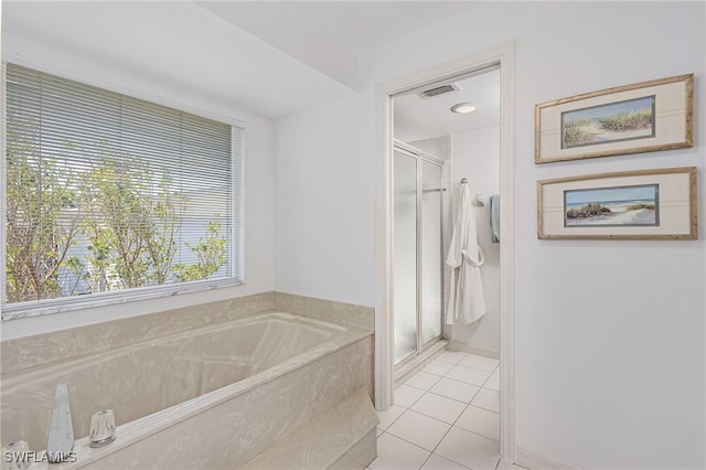 2810 Teal Ct, Saint James City, FL 33956 - full bath with a garden tub, visible vents, a stall shower, and tile patterned flooring