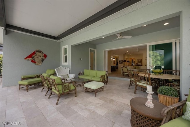 view of patio with outdoor dining space, outdoor lounge area, and ceiling fan