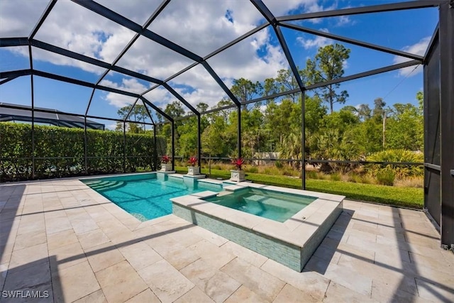 view of pool with a lanai, a patio area, and a pool with connected hot tub