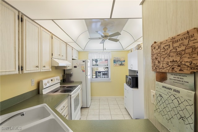 755 Village Cir Unit 203, Venice, FL 34292 - kitchen featuring under cabinet range hood, a sink, white range with electric stovetop, black microwave, and light tile patterned floors