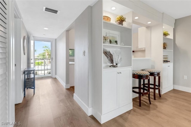 309 Goodlette-Frank Rd S Unit A305, Naples, FL 34102 - hallway featuring light wood-type flooring, baseboards, and recessed lighting