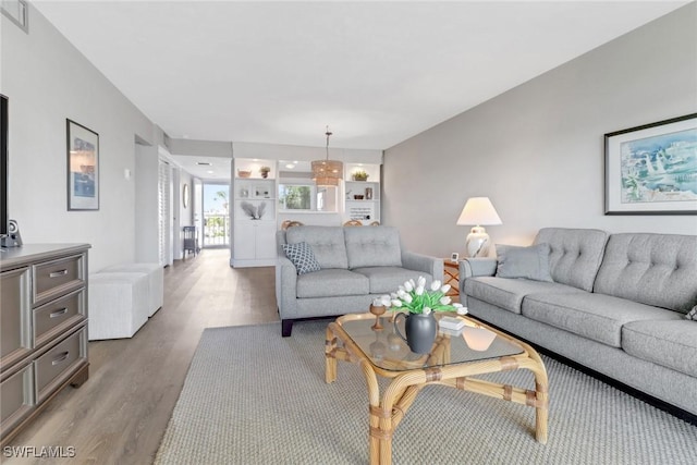 309 Goodlette-Frank Rd S Unit A305, Naples, FL 34102 - living room featuring wood finished floors