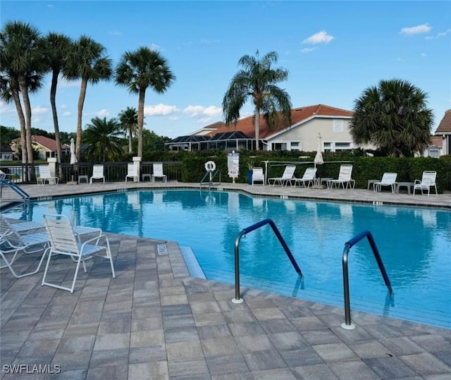 12713 Devonshire Lakes Dr, Fort Myers, FL 33913 - pool with fence and a patio