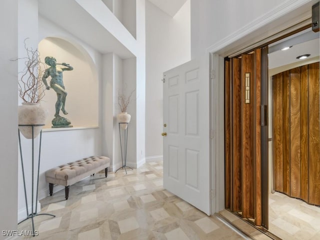 265 Colonade Cir, Naples, FL 34103 - corridor featuring baseboards