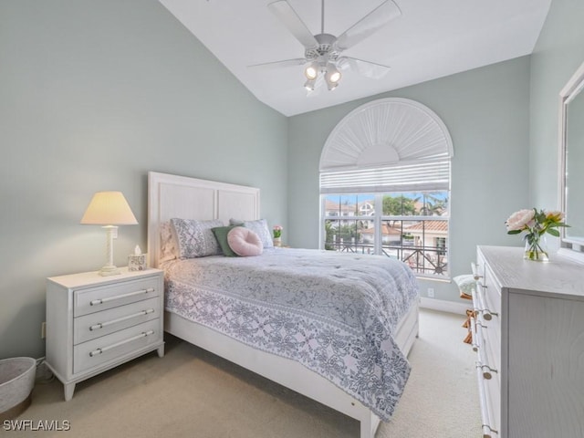 265 Colonade Cir, Naples, FL 34103 - bedroom featuring baseboards, lofted ceiling, light colored carpet, and a ceiling fan