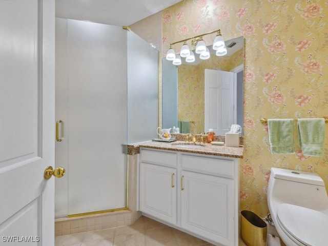 265 Colonade Cir, Naples, FL 34103 - bathroom featuring vanity, wallpapered walls, a stall shower, tile patterned floors, and toilet