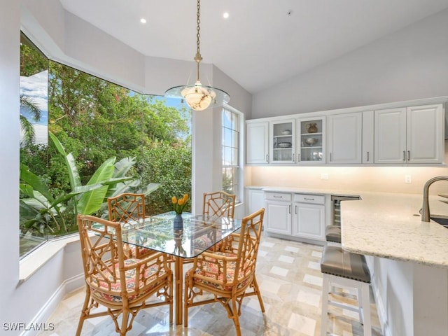 265 Colonade Cir, Naples, FL 34103 - dining room featuring recessed lighting, baseboards, and vaulted ceiling