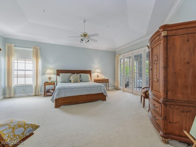 265 Colonade Cir, Naples, FL 34103 - bedroom with access to exterior, multiple windows, light colored carpet, and a tray ceiling