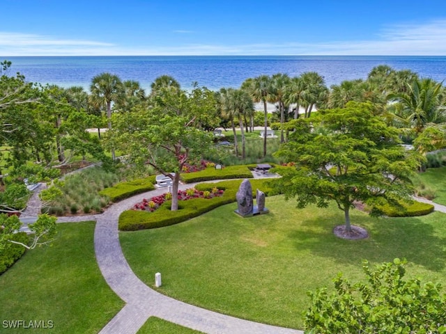 265 Colonade Cir, Naples, FL 34103 - surrounding community with a water view and a lawn
