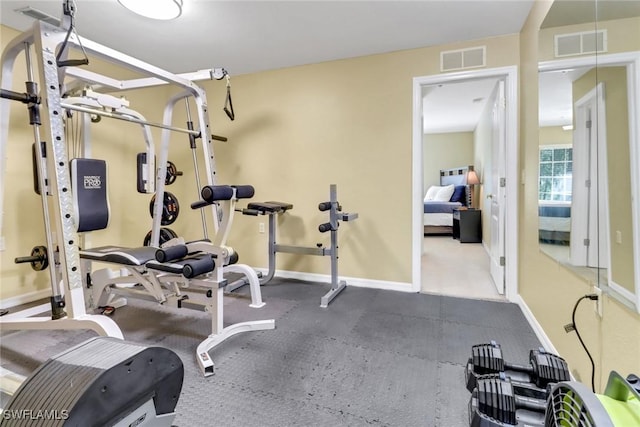 workout area with baseboards and visible vents