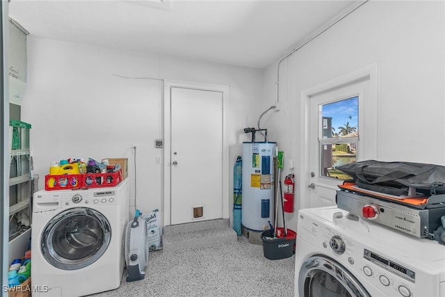 laundry area featuring laundry area and water heater