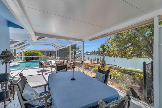 view of patio / terrace with a water view, glass enclosure, an outdoor hangout area, outdoor dining area, and an outdoor pool