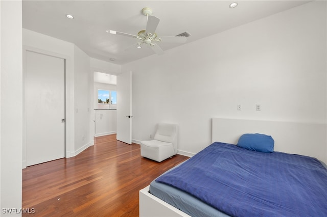 bedroom with recessed lighting, baseboards, ceiling fan, and wood finished floors