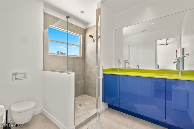 full bathroom featuring tile patterned flooring, a shower stall, baseboards, toilet, and double vanity