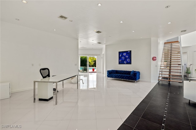 interior space with tile patterned flooring, recessed lighting, visible vents, and baseboards