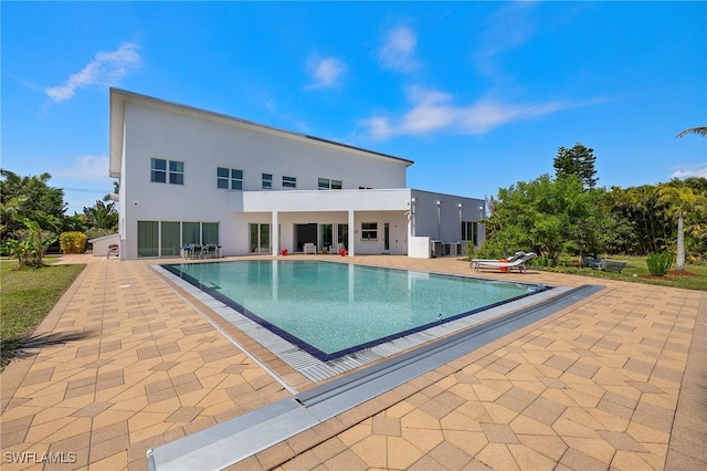 outdoor pool with a patio