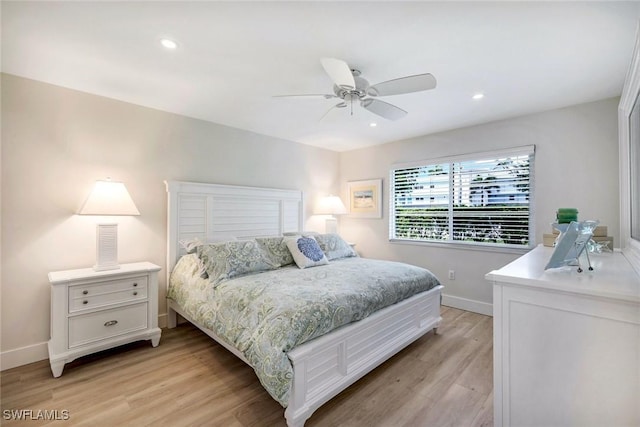 bedroom featuring recessed lighting, baseboards, ceiling fan, and light wood finished floors