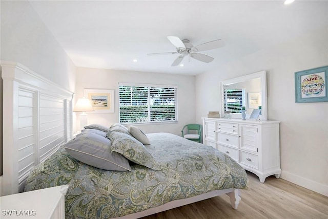 bedroom with recessed lighting, a ceiling fan, light wood-type flooring, and baseboards