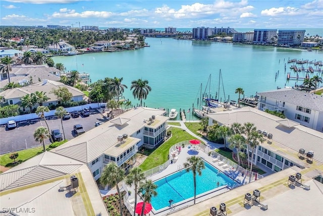 bird's eye view featuring a view of city and a water view
